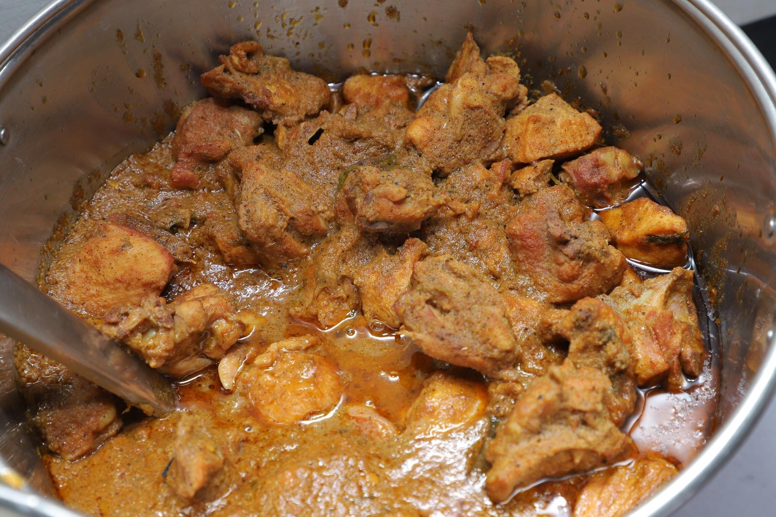 Traditional chicken gravy prepared by MJ Catering